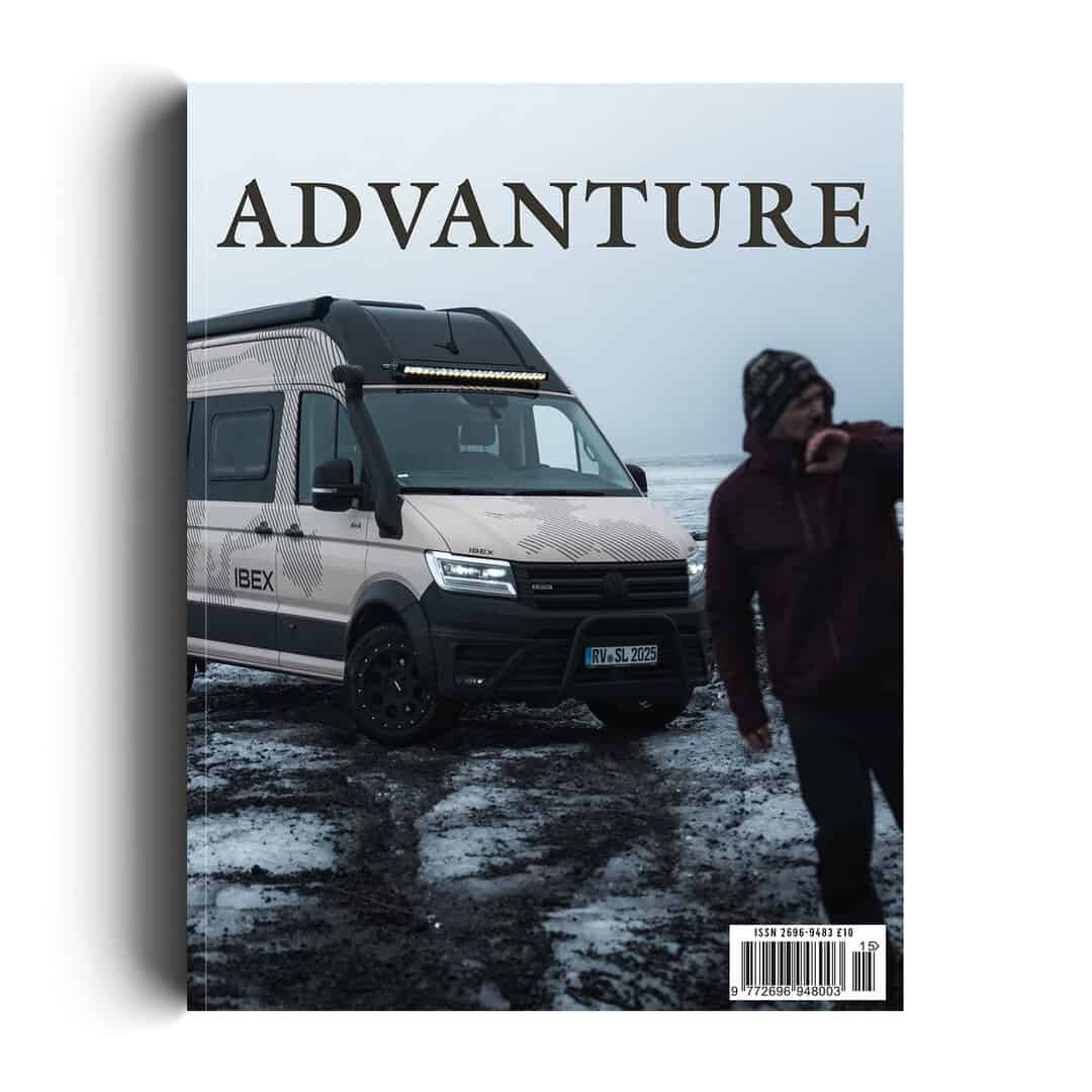 A Sunlight Ibex 4x4 camper van parked on a remote road in Iceland, surrounded by rugged landscape